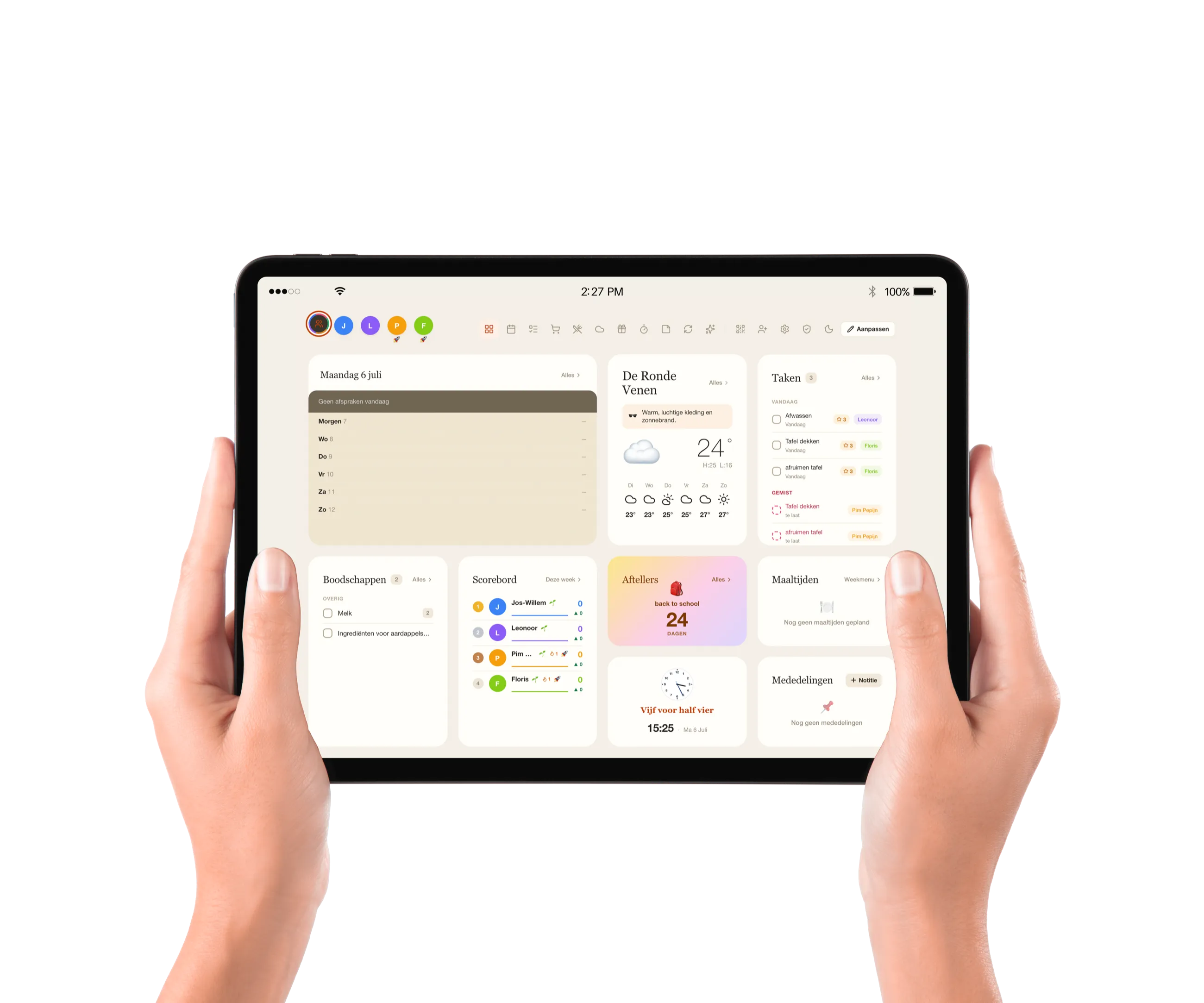 Het volledige Family Planner-dashboard op een iPad in handen